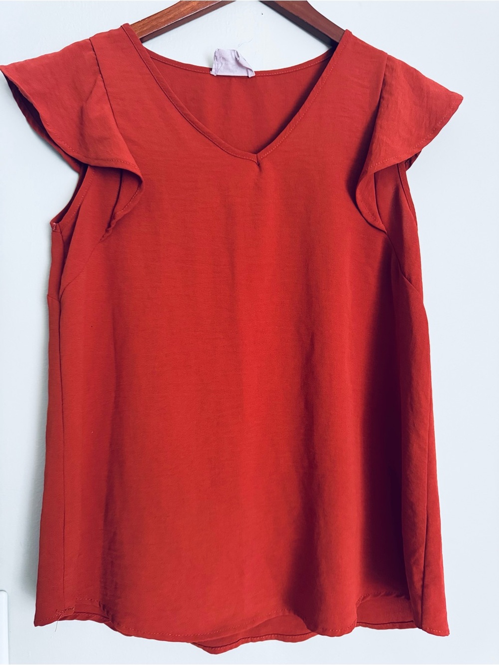 Women’s burnt orange V-Neck Flutter Sleeve Top
